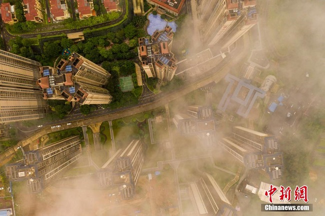 Учжоуда т?ман т?нып, ертег?дей к?р?н?с ?алыптасты