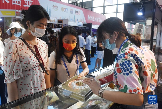 АСЕАН тауарлары ?ытай-АСЕАН к?рмес?нде жа?сы с?раныс?а ие болды