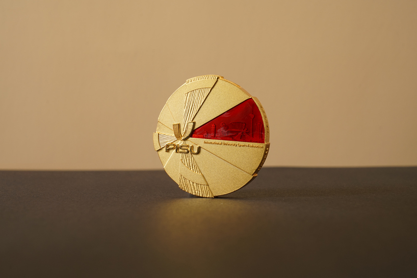 Чэнду Универсиадасыны? эмблемасы, т?мары, алауы ж?не медальдары к?рсет?лд?