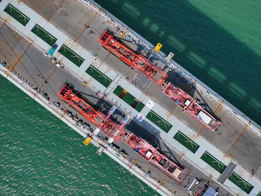 Хуанмаохай те??з арнасыны? Гаоланьган к?п?р? толы? т?тасты