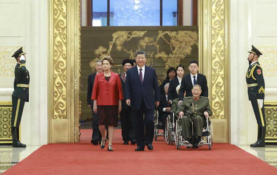 Т?ра?а Си Цзиньпин мемлекетт?к ??рмет орден? мен мемлекетт?к ??рмет ата?ына ие бол?андарды марапаттады