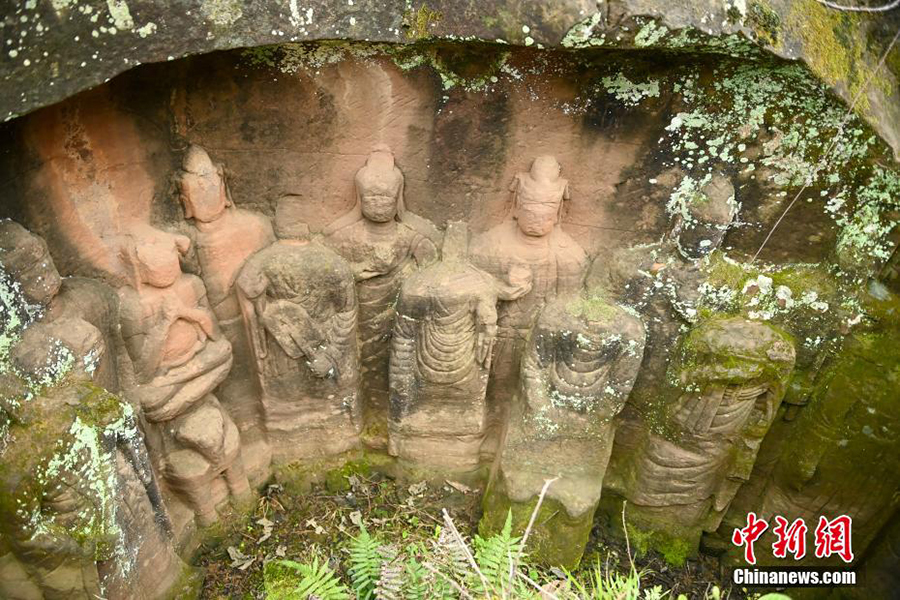 Сычуанны? Мэйшанында?ы тау арасына жасырын?ан жартас м?с?ндер